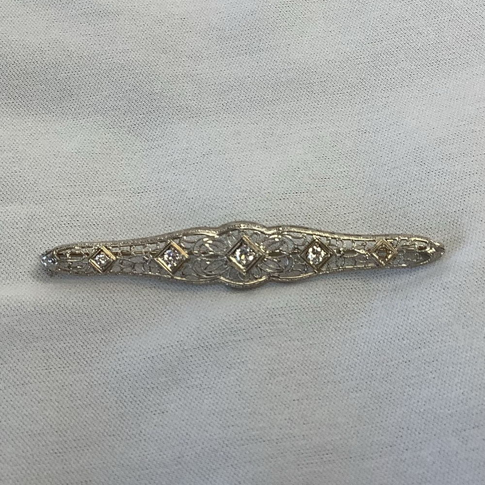 Vintage filigree diamond brooch